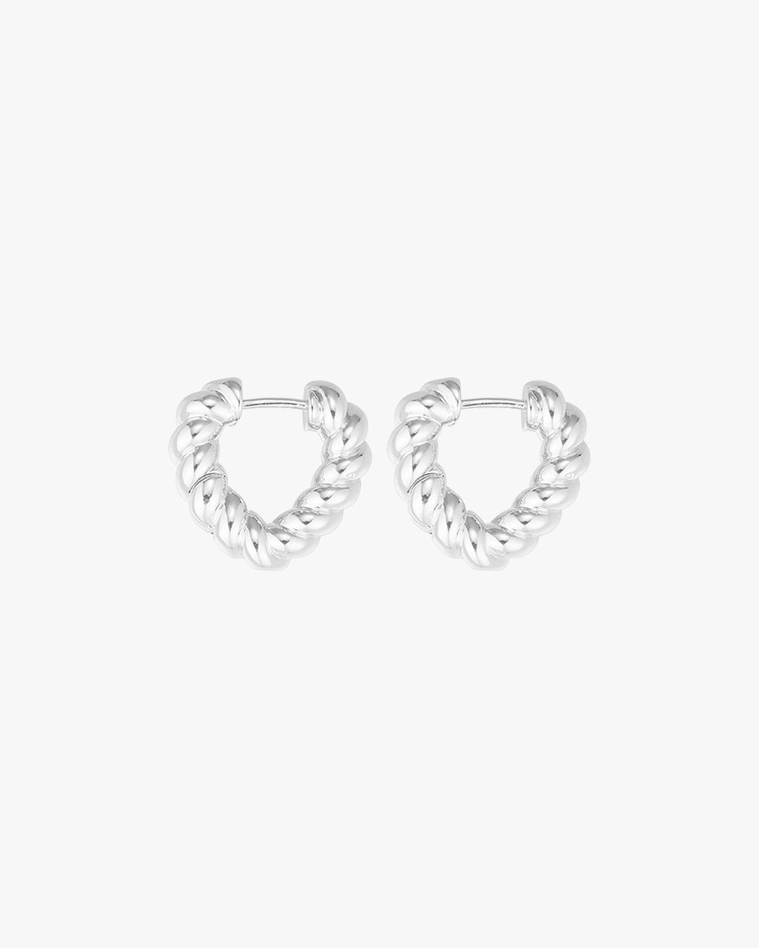 Silver twisted hoop earrings on a white background, showcasing elegant design and modern style. Perfect for fashion accessories and jewelry lovers.