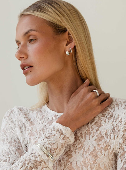 Stud Earrings – Polished Silver Dome Design